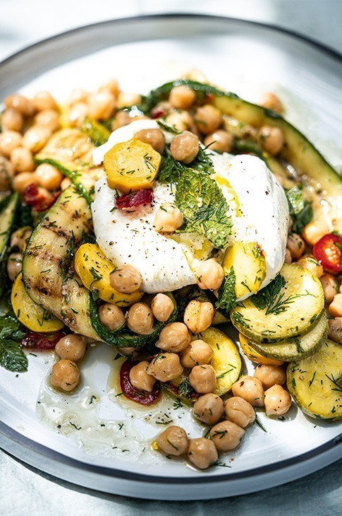 This recipe bursts with freshness thanks mainly to the pickled touch and the hint of fresh lemon, dill, and mint. Chickpeas then come in for roundness and protein, while burrata serves a hearty portion of creamy goodness.