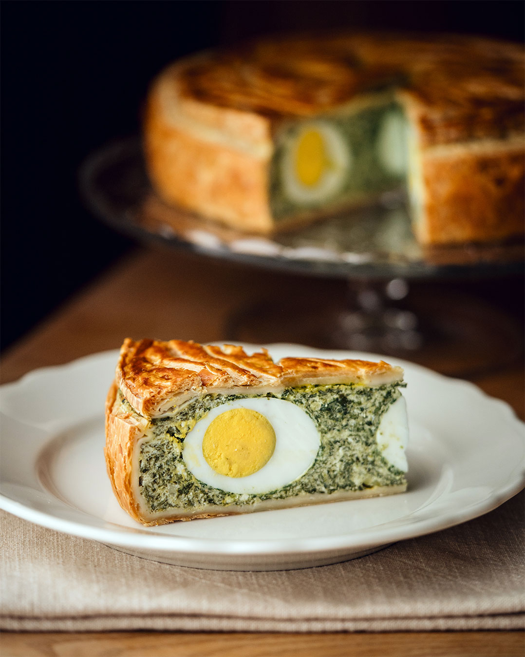 The savoury Italian torta pasqualina oozes spring, right down to its name—pasqualina meaning “Easter.” As you might have guessed, it’s the perfect Easter lunch showstopper! Filled to the brim with crunchy greens, silky ricotta, and whole eggs, the torta pasqualina is nutritious, festive and (most importantly) delicious.